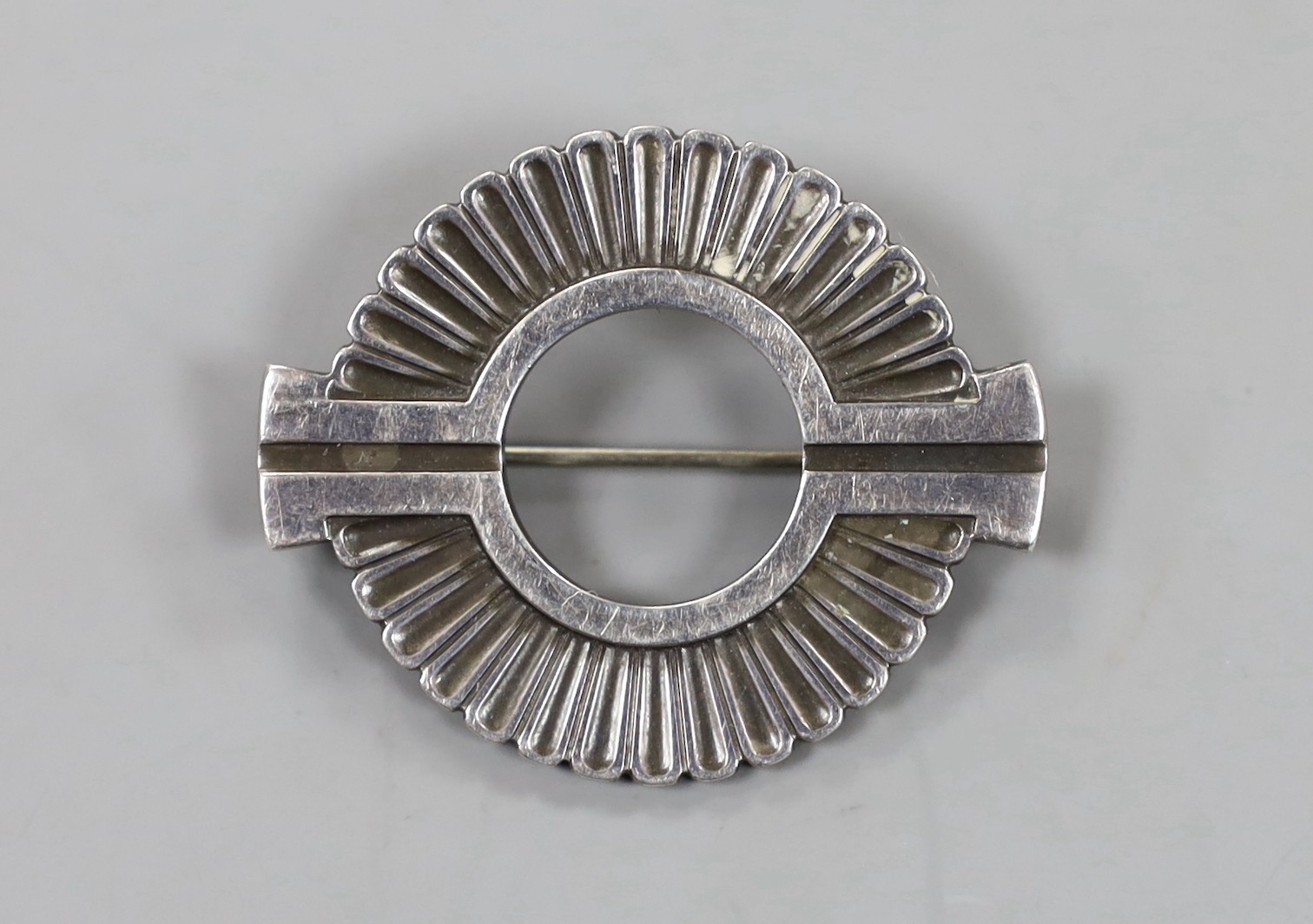 A Georg Jensen sterling 925 studio art brooch, of openwork circular form, design no. 310, 33mm.